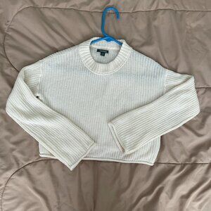 crop sweater. Rolled hem.  Cream color